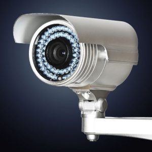 A security camera with dark background